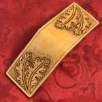 Leather money clip with oak leaf carving