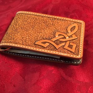 Carved leather money clip wallet with Celtic knot design