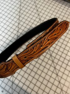 Northwest Style floral vine design on a custom leather belt.